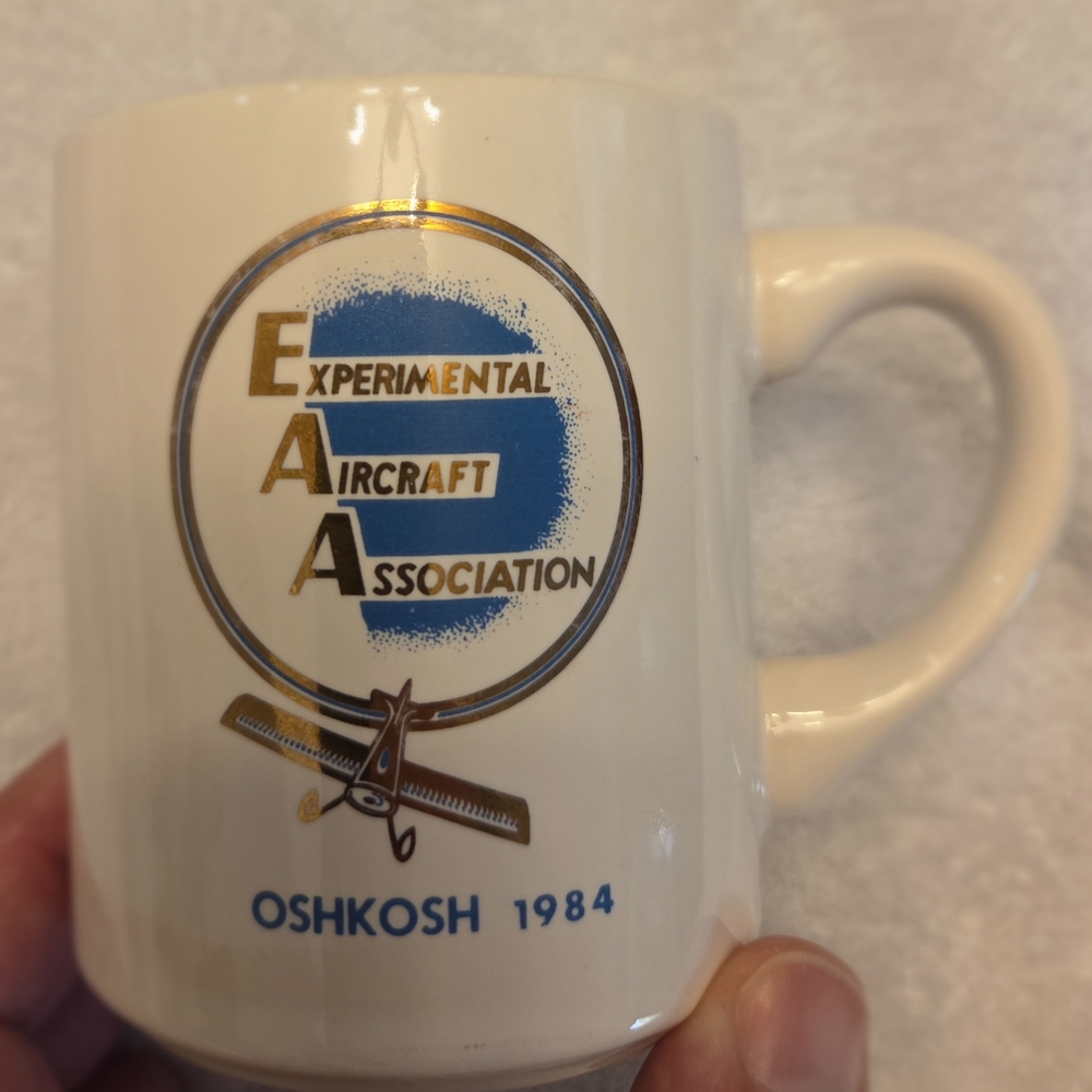 Oshkosh 1984 White Ceramic Mug Set
